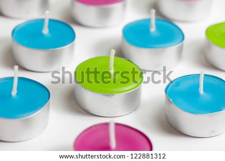 a group of tea light candles