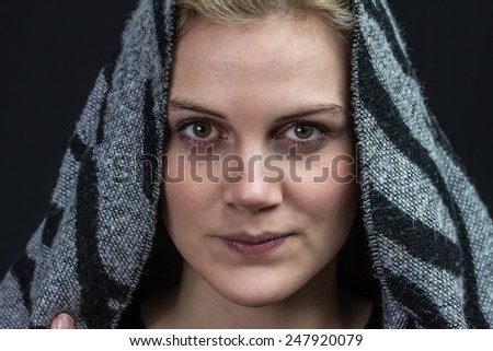 young woman with a scarf as a head scarf