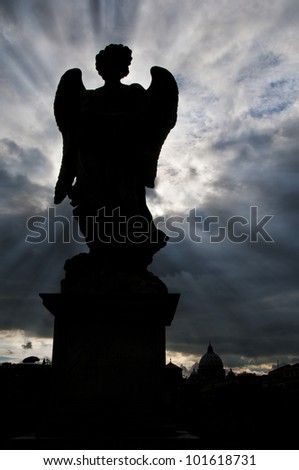 Bernini\'s angel statue as the sun sets