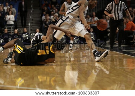 UNIVERSITY PARK, PA - FEB 16: Penn State's Jermaine Marshall grabs a loose ball against Iowa at the Byrce Jordan Center on February 16, 2012 in University Park, PA