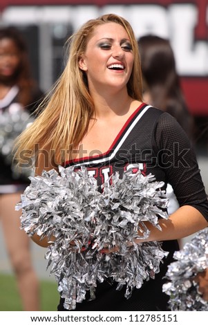 PHILADELPHIA, PA - SEPTEMBER 8: A Temple cheerleader entertains the crowd against Maryland on September 8, 2012 at Lincoln Financial Field in Philadelphia, PA.