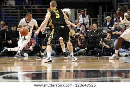 UNIVERSITY PARK, PA - FEB 16: Penn State's Tim Frazier drives to the basket against Iowa at the Byrce Jordan Center on February 16, 2012 in University Park, PA