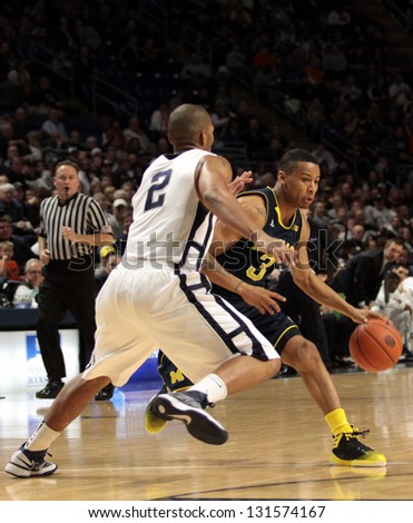 UNIVERSITY PARK, PA - FEBRUARY 27: Michigan's Trey Burke drives to the basket against Penn State  at the Byrce Jordan Center February 27, 2013 in University Park, PA