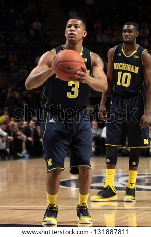 UNIVERSITY PARK, PA - FEBRUARY 27: Michigan\'s Trey Burke shoots a free throw during  a game against Penn State  at the Byrce Jordan Center February 27, 2013 in University Park, PA