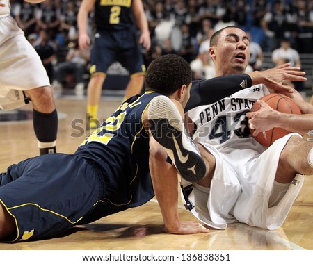 UNIVERSITY PARK, PA - FEBRUARY 27: Penn State\'s Ross Travis fights for a loose ball against Michigan at the Byrce Jordan Center February 27, 2013 in University Park, PA