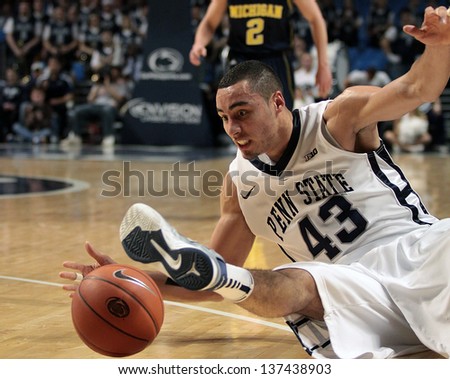 UNIVERSITY PARK, PA - February 27: Penn State\'s Ross Travis #43 dives for a loose  basketball against Michigan at the Byrce Jordan Center February 27, 2013 in University Park, PA