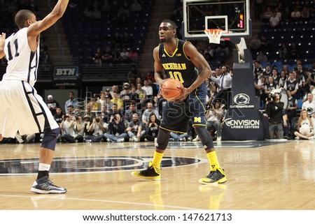 UNIVERSITY PARK, PA - FEBRUARY 27: Michigan\'s Tim Hardaway looks to pass against Penn State at the Byrce Jordan Center February 27, 2013 in University Park, PA