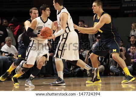 UNIVERSITY PARK, PA - FEBRUARY 27: Penn State\'s Nick Colela takes the pass from a teammate against Michigan at the Byrce Jordan Center February 27, 2013 in University Park, PA