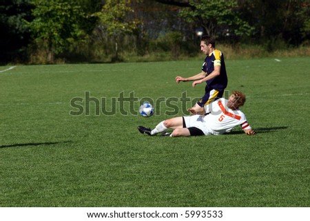 Soccer Player Tackling