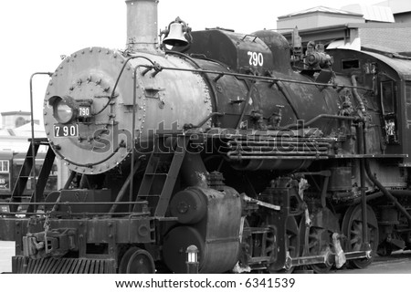 Train in the rail-yard, steam engine