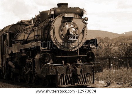 Sepia-toned Steam Engine, Train with conductor
