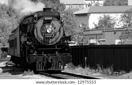 Steam Engine approaching, smoke billowing, Old Train