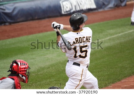 PITTSBURGH - SEPTEMBER 24 : Andy LaRoche of Pittsburgh Pirates swings at a pitch against Cincinnati Reds on September 24, 2009 in Pittsburgh, PA.
