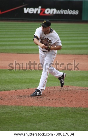 PITTSBURGH - SEPTEMBER 24 : Steven Jackson of Pittsburgh Pirates follows through on a pitch against Cincinnati Reds on September 24, 2009 in Pittsburgh, PA.