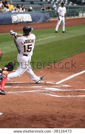 PITTSBURGH - SEPTEMBER 24 : Andy LaRoche of Pittsburgh Pirates swings at a pitch against Cincinnati Reds on September 24, 2009 in Pittsburgh, PA.