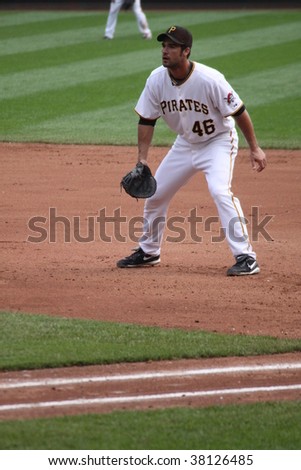 PITTSBURGH - SEPTEMBER 24 : Garrett Jones of Pittsburgh Pirates playing first base against the Reds on September 24, 2009 in Pittsburgh, PA.