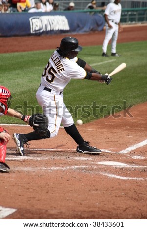 PITTSBURGH - SEPTEMBER 24 : Lastings Miledge of the Pittsburgh Pirates swings at a pitch against Cincinnati Reds on September 24, 2009 in Pittsburgh, PA.
