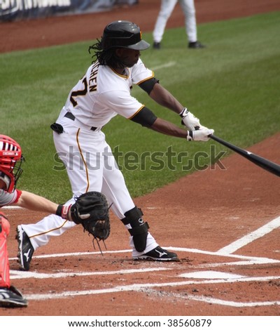PITTSBURGH - SEPTEMBER 24 : Andrew McCutchen of the Pittsburgh Pirates swings at a pitch against Cincinnati Reds on September 24, 2009 in Pittsburgh, PA.