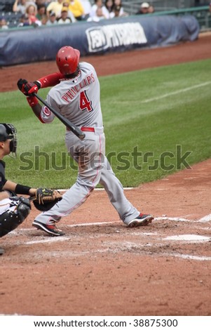 PITTSBURGH - SEPTEMBER 24 : Brandon Phillips of the Cincinnati Reds swings at a pitch against the Pirates on September 24, 2009 in Pittsburgh, PA.
