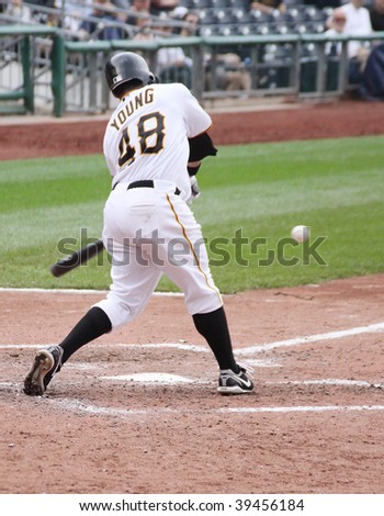 PITTSBURGH - SEPTEMBER 24 :Delwynn Young of the Pittsburgh Pirates swings at a pitch against Cincinnati Reds on September 24, 2009 in Pittsburgh, PA.