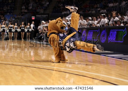 UNIVERSITY PARK, PA - FEBRUARY 24: Penn State\'s mascot, the Nittany Lion, entertains the crowd, during a game at the Byrce Jordan Center February 24, 2010 in University Park, PA