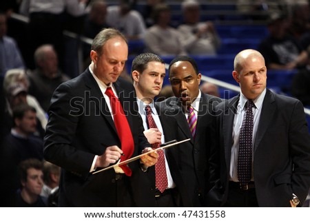 UNIVERSITY PARK, PA - FEBRUARY 24: Ohio State coach Thad Motta and staff draw up a play during a game against Penn State at the Byrce Jordan Center February 24, 2010 in University Park, PA