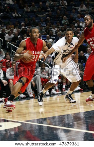 UNIVERSITY PARK, PA - FEBRUARY 24: Ohio State\'s Evan Turner drives to the basket past Penn State\'s Jeff Brooks in a game at the Byrce Jordan Center February 24, 2010 in University Park, PA