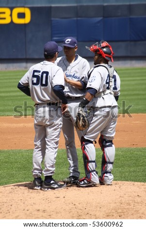 SCRANTON - MAY 13: The Columbus Clippers Carlos Santana, Jeanmar Gomez talk with coach Charles Nagy in a game against Scranton Wilkes Barre Yankees in a game at PNC Field May 13, 2010 in Scranton, PA