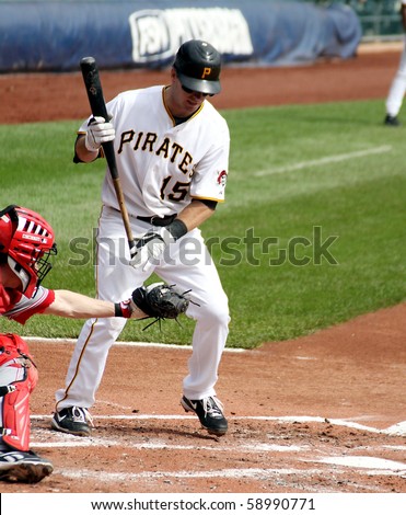 PITTSBURGH - SEPTEMBER 24 : Andy LaRoche of the Pittsburgh Pirates watches a  pitch against Cincinnati Reds on September 24, 2009 in Pittsburgh, PA.