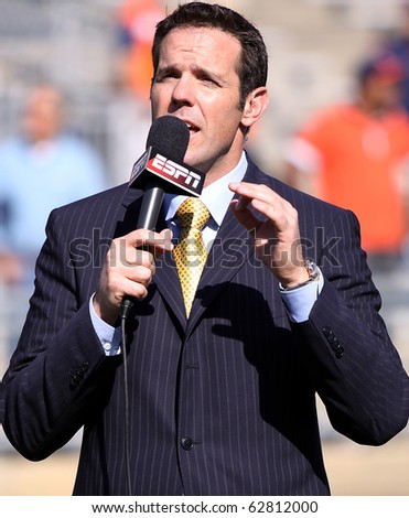 UNIVERSITY PARK, PA - OCT 9: ESPN announcer Brian Griese makes a report from the sidelines during the Penn State/Illinois at Beaver Stadium October 9, 2010 in University Park, PA