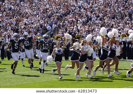UNIVERSITY PARK, PA - OCT 9: Penn State state players and cheerleaders enter the field before a game against Illinois at Beaver Stadium October 9, 2010 in University Park, PA