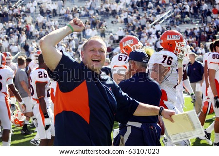 UNIVERSITY PARK, PA - OCT 9: Illinois assistant head coach celebrates a victory against Penn State at Beaver Stadium October 9, 2010 in University Park, PA
