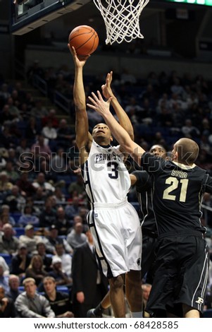 UNIVERSITY PARK, PA - JANUARY 5: Penn State\'s Jermaine Marshall gets a shot off in heavy traffic against Purdue at the Byrce Jordan Center January 5, 2011 in University Park, PA