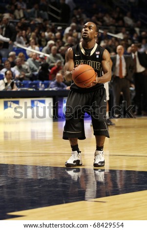 UNIVERSITY PARK, PA - JANUARY 5:  Purdue\'s point guard Lewis Jackson shoot free throws after an intentional foul at the Byrce Jordan Center January 5, 2011 in University Park, PA