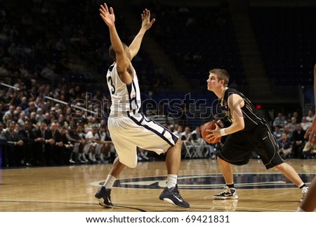 UNIVERSITY PARK, PA - JANUARY 5: Purdue\'s#24 Ryne Smith looks to pass against Penn State at the Byrce Jordan Center January 5, 2011 in University Park, PA