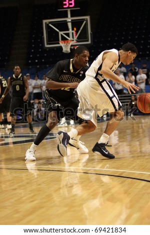 UNIVERSITY PARK, PA - JANUARY 5: Penn State\'s Talor Battle dribbles the ball up the court during a game January 5, 2011 in University Park, PA