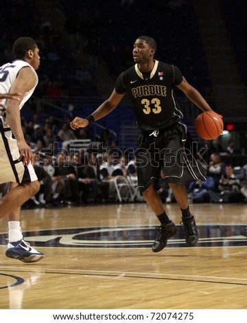 UNIVERSITY PARK, PA - JANUARY 5: Purdue\'s #33 E\'Twaun Moore looks to drive to the basket against Penn State at the Byrce Jordan Center on January 5, 2011 in University Park, PA