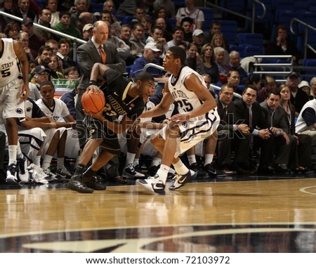 UNIVERSITY PARK, PA - JANUARY 5: Purdue\'s No. 33 E\'Twaun Moore looks for some room in a game against Penn State at the Byrce Jordan Center on January 5, 2011 in University Park, PA