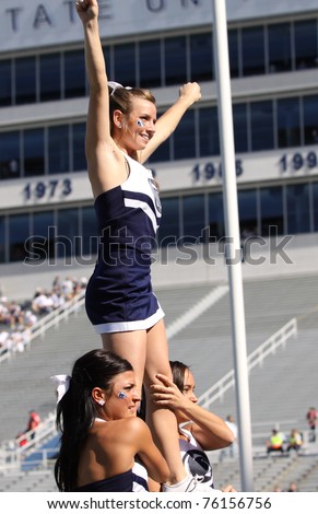 UNIVERSITY PARK, PA - OCT 9: Unidentified Penn State cheerleaders cheer before a game against  Illinois at Beaver Stadium on October 9, 2010 in University Park, PA