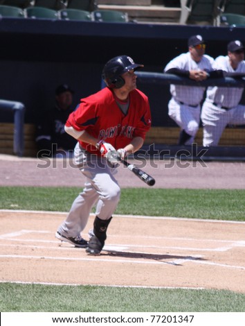 SCRANTON, PA - MAY 8: Pawtucket Red Sox Drew Sutton watches his hit as he runs to first base against the Scranton Wilkes Barre Yankees at PNC Field on May 8, 2011 in Scranton, PA.