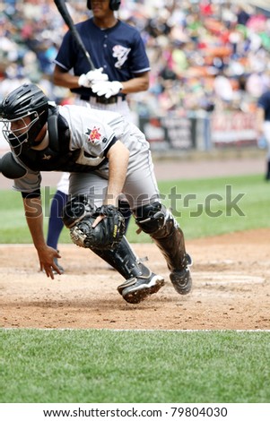 SCRANTON, PA - MAY 24:Indianapolis Indians catcher Wyatt Toregas chases a wild pitch behind home-plate against the Scranton Wilkes Barre Yankees at PNC Field on May 24, 2011 in Scranton, PA.