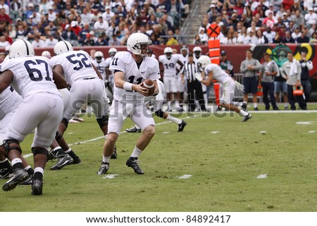 PHILADELPHIA, PA. - SEPTEMBER 17: Penn State Quarterback back Matthew McGloin is ready to hand off in a game against Temple on September 17, 2011 at Lincoln Financial Field in Philadelphia, PA.