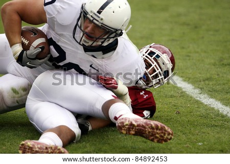 PHILADELPHIA, PA. - SEPTEMBER 17: Penn State Tight end Andrew Szczerba fights for extra yardage during a game against Temple on September 17, 2011 at Lincoln Financial Field in Philadelphia, PA.