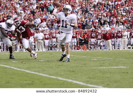 PHILADELPHIA, PA. - SEPTEMBER 17: Penn State Quarterback back Matthew McGloin looks to pass down field in a game against Temple on September 17, 2011 at Lincoln Financial Field in Philadelphia, PA.