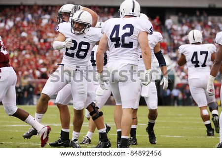 PHILADELPHIA, PA. - SEPTEMBER 17: Penn State\'s Drew Astorino and Michael Mauti celebrate a tackle during a game against Temple on September 17, 2011 at Lincoln Financial Field in Philadelphia, PA.