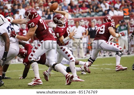 PHILADELPHIA, PA. - SEPTEMBER 17: Temple Quarterback Mike Gerardi stands in the pocket and throws in a game  against Penn State on September 17, 2011 at Lincoln Financial Field in Philadelphia, PA.