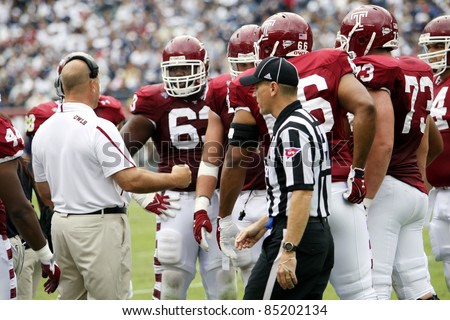 PHILADELPHIA, PA. - SEPTEMBER 17: Temple Offensive Linemen talks to their coach during a game against Penn State on September 17, 2011 at Lincoln Financial Field in Philadelphia, PA.