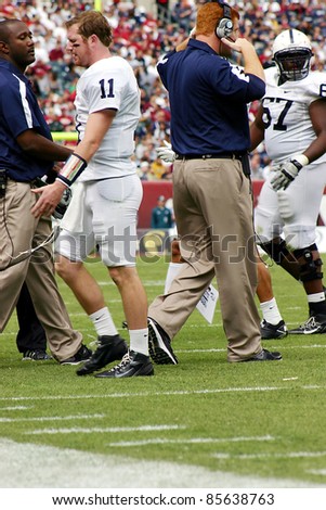 PHILADELPHIA, PA. - SEPTEMBER 17: Penn State Quarterback Matthew McGloin walks off the field during a game against Temple on September 17, 2011 at Lincoln Financial Field in Philadelphia, PA.
