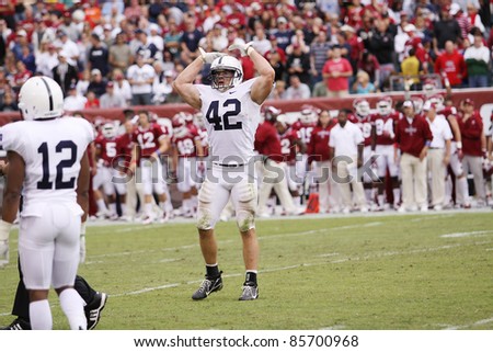 PHILADELPHIA, PA. - SEPTEMBER 17: Penn State linebacker Mike Mauti tries to get the Penn State fans excited against Temple on September 17, 2011 at Lincoln Financial Field in Philadelphia, PA.