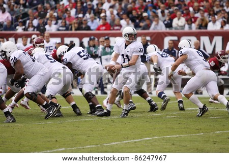 PHILADELPHIA, PA. - SEPTEMBER 17: Penn State Quarterback Matthew McGloin looks to hand off during  a game against Temple on September 17, 2011 at Lincoln Financial Field in Philadelphia, PA.